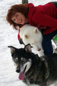 Cozy mystery author Rae Davies with the dogs in her life.